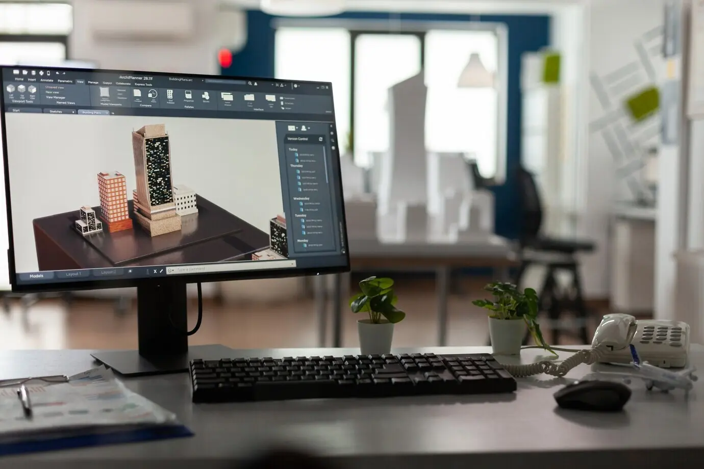 Unoccupied architects’ office with a computer on the desk